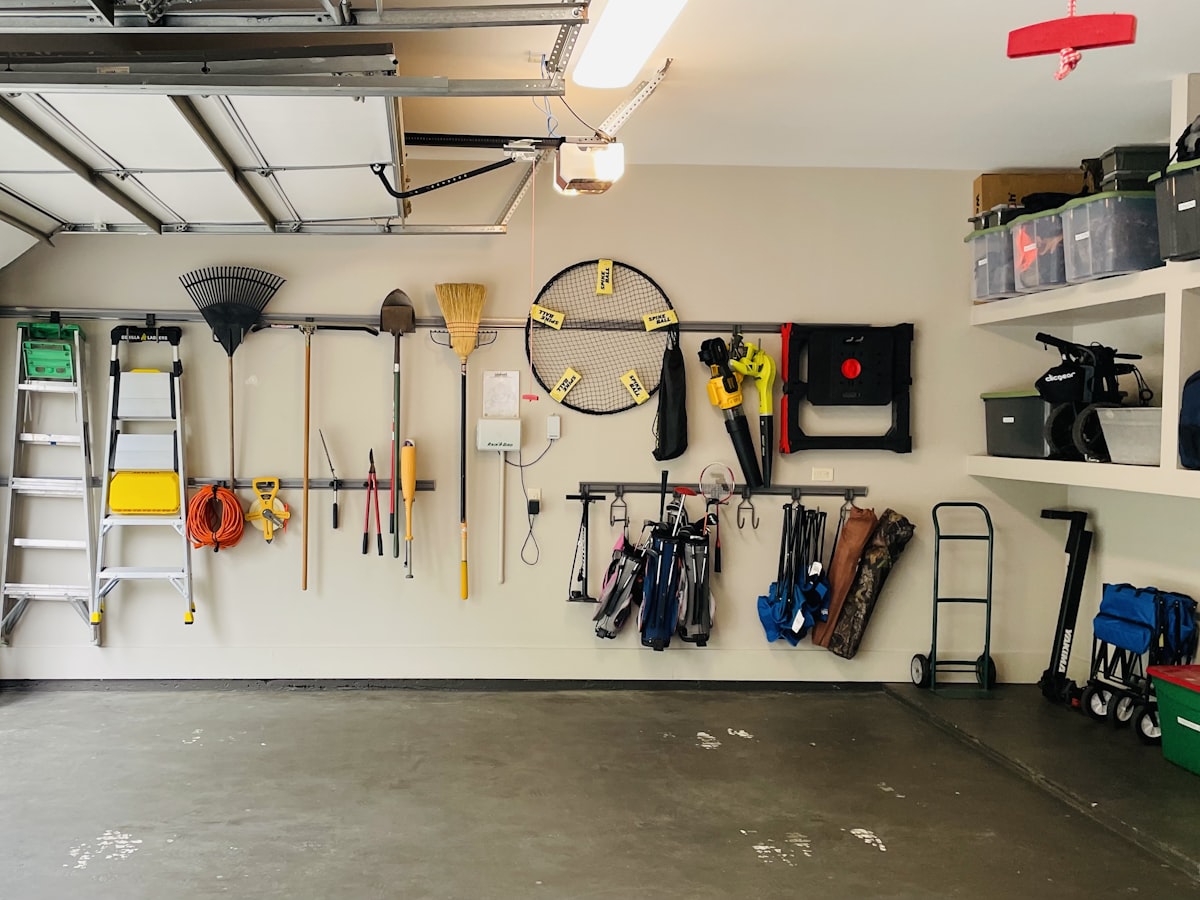 Garage detailing tools representing the Pressure Washer Nozzle Holder concept