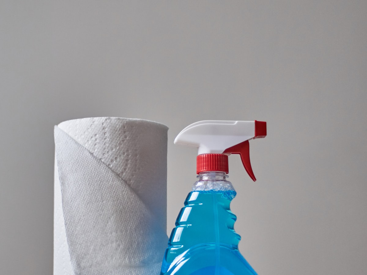 Detailing spray bottles grouped on a shelf for the Detail Dock Bottle Mount concept